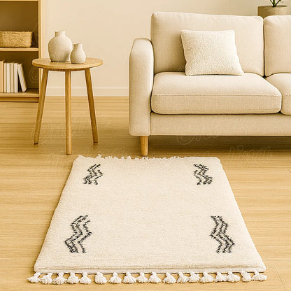 Moroccan wool rug with black zigzag wave motifs placed in a bright European living room with beige sofa and wooden table