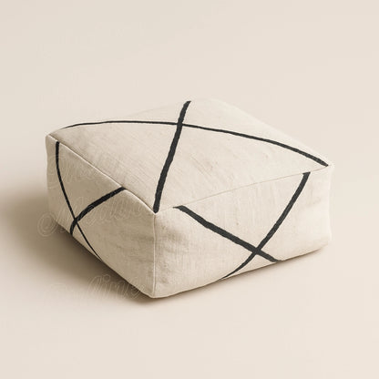 Minimalist square floor pouf in beige handwoven fabric with black lines, Moroccan artisan home decor