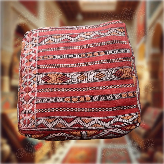 Red Hanbel square pouf, handmade from wool and cotton with traditional Berber motifs — ideal for elegant and modern Moroccan-inspired décor.