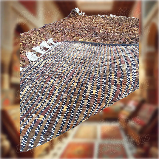 Backside of a Moroccan Boucharouite rug handwoven from recycled fabric and leather strips — sustainable Moroccan craftsmanship.