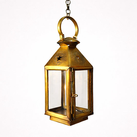 Antique brass Moroccan candle lantern with glass panels designed to hang or sit on a table