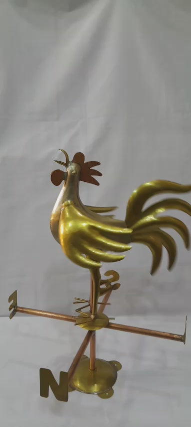 Short video showing a handcrafted Moroccan metal rooster transformed into a functional weathervane – traditional hammered dinanderie from Marrakech
